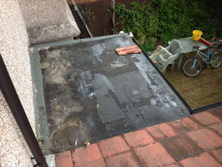 Flat roof in need of repair